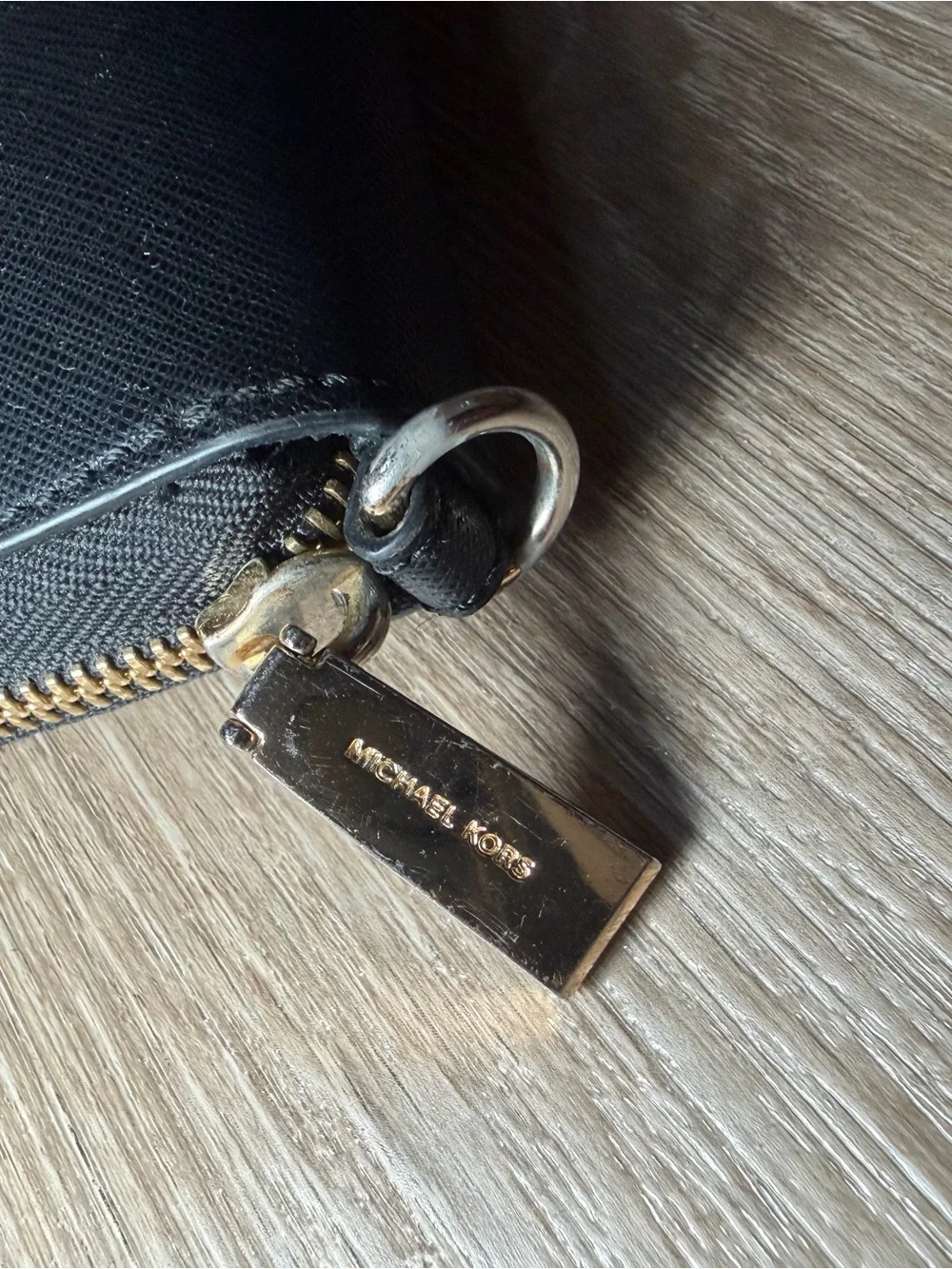 Michael Kors Black Zip-Around Saffiano Wallet with Gold Logo